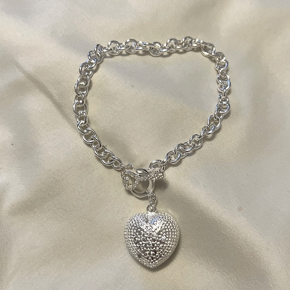 .925 sterling silver bracelet with heart pendant.  8 1/2 inches long.
